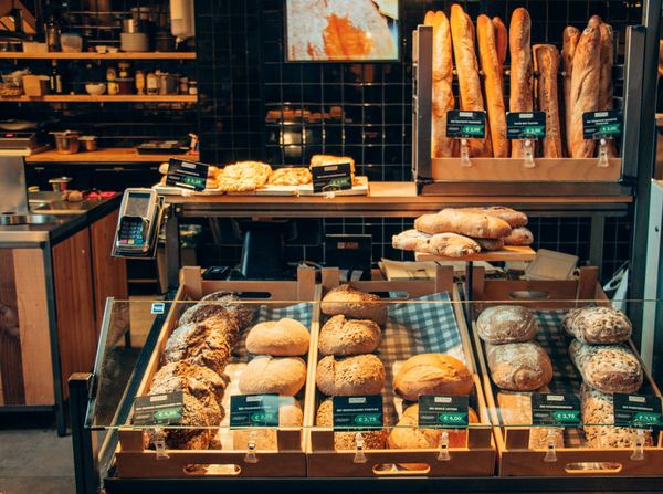 A cabinet of fresh bread and pastries